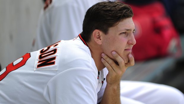 Canberra Cavalry pitcher Aaron Thompson looks on.