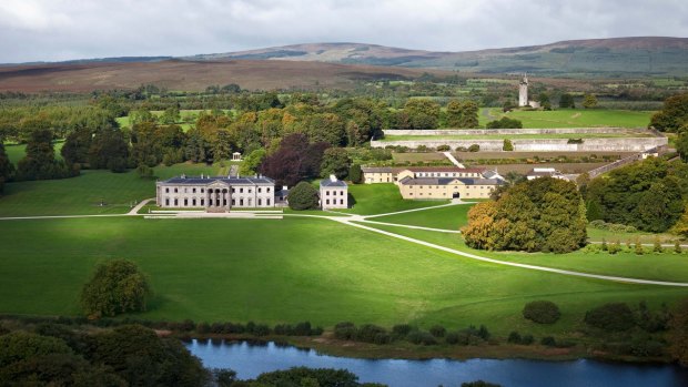 Ballyfin House is surrounded by lush, manicured gardens.