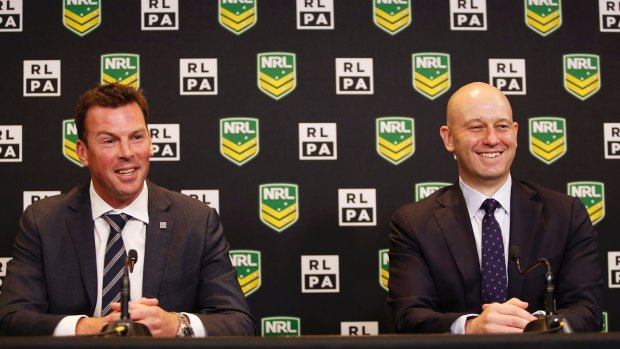 Done deal - and not before time: RLPA chief executive Ian Prendergast and NRL boss Todd Greenberg are all smiles during a press conference on Friday to announce the new CBA.