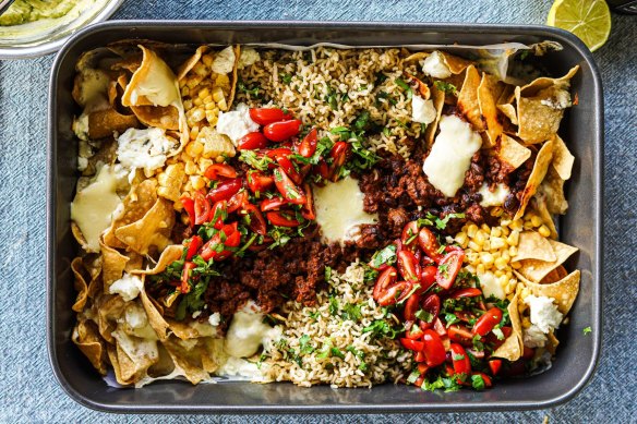 Beef taco rice with creamy, spicy avo dressing (top left).