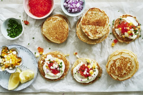 These buckwheat blinis are the perfect vehicle for a caviar party with all the trimmings (sour cream, chopped chives, boiled egg and onion, pictured).