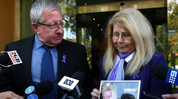 Mark and Faye Leveson with a photograph of their son Matthew Leveson. 
