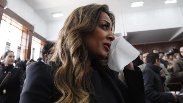 Marwa Omara, fiancee of Al-Jazeera journalist Mohamed Fahmy, reacts in court.