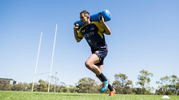 Brumbies centre Andrew Smith has returned to Canberra after a stint overseas.