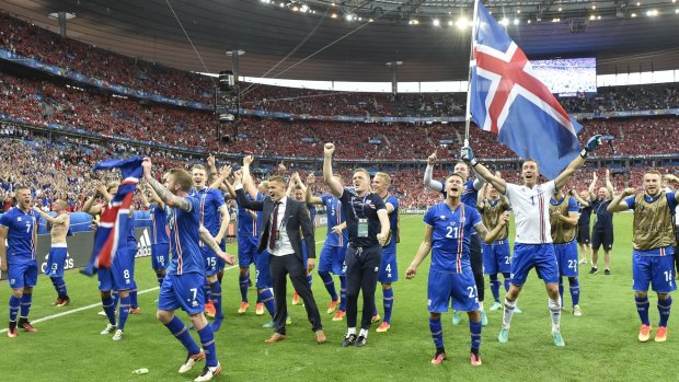 Iceland celebrate after beating Austria 2-1 at Stade de France last Wednesday night and advancing to the round of 16.
