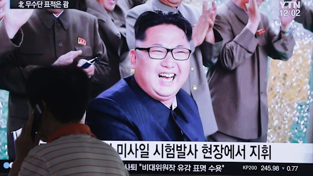 A South Korean TV news channel shows an image of North Korean leader Kim Jong-un.