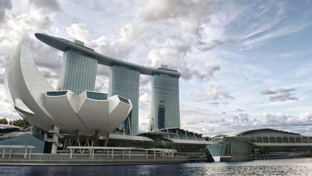 A view of the Marina Bay Sands in Singapore. Marina Bay Sands is an integrated resort fronting Marina Bay in Singapore. It is billed as the world's most expensive standalone casino property at 6 billion dollars.
