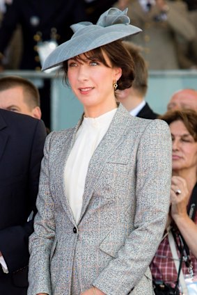 June 6, 2014: At a D-Day service in a Gina Foster hat.