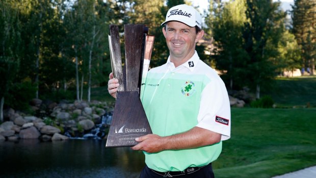 Champion: Greg Chalmers poses with the trophy after winning the Barracuda Championship.