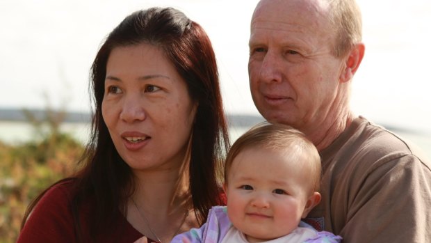 Wendy Li and David Farnell with baby Pipah.