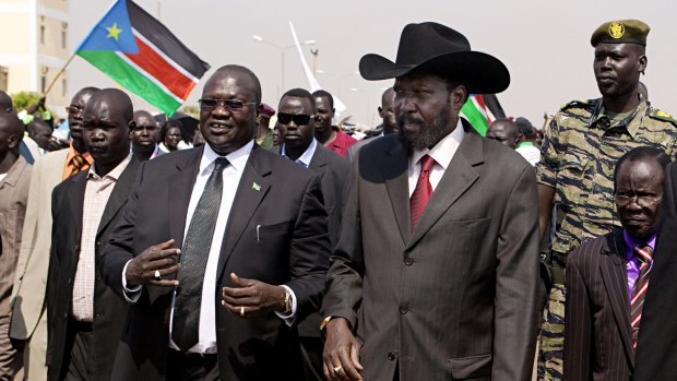 South Sudanese President Salva Kiir, centre-right, and vice-president Riek Machar, centre-left in 2011.