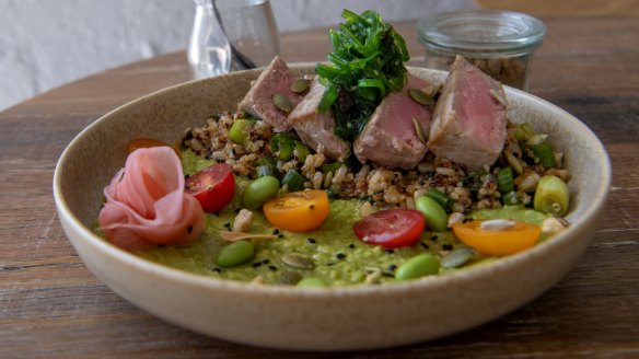 Seared-tuna bowl with quinoa and brown rice, crunchy with toasted nuts and seeds.