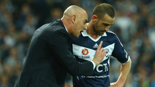 Victory coach Kevin Muscat speaks to Carl Valeri during the this season's grand final. Valeri is favoured to be named captain.