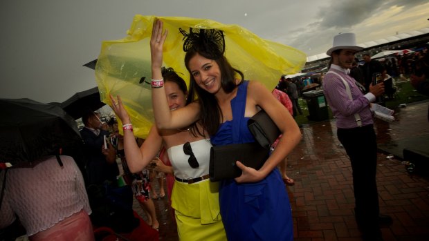 Melbourne Cup weather can be notoriously fickle, so consider changing your shoes and packing some wet weather gear.