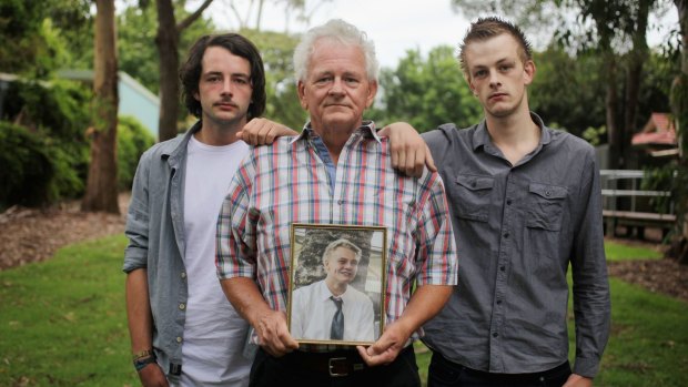 Disappointed: Michael Christie, with his sons Peter and John.