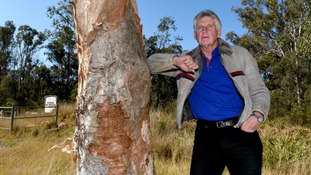 Wayne Olling at the Shanes Park Woodland, a site set aside by the State Government for protection and part of which is now under threat of a new highway.