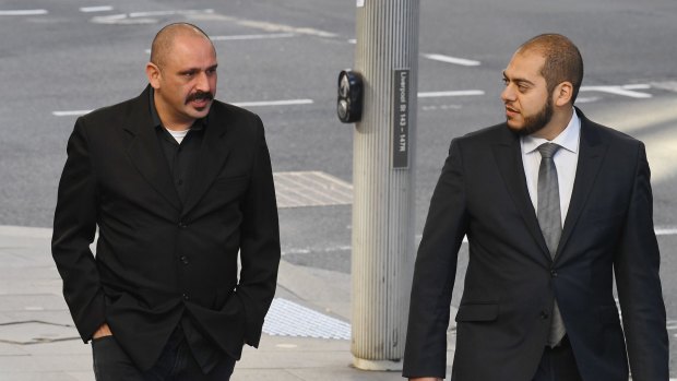 Khaled Merhi, left, with his lawyer Moustafa Kheir outside the Downing Centre Local Court on Thursday.