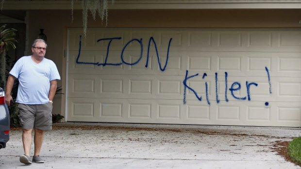 Private Investigator for the Palmer family, Walter Zalisko outside the home following a vandalism attack. 