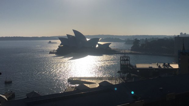 Smog shrouds the Opera House as smoke from hazard reduction burns blow across Sydney.