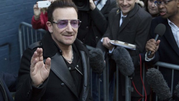 Irish band U2's lead singer, Bono, cracked an eye socket and broke one arm in six places after falling off a bicycle on Sunday in New York's Central Park.