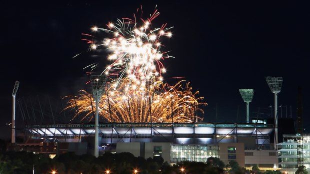 Ooh, aah: The 9.30pm fireworks display over the MCG, seen from Federation Square, on New Year's Eve 2015. 