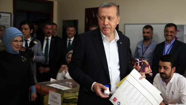 Turkey's President Recep Tayyip Erdogan, accompanied by his wife, Emine, at a polling station in Istanbul, Turkey, will be disappointed with the results of the election.