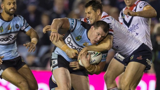 Go-ahead Gal: Paul Gallen surges forward against the Roosters.