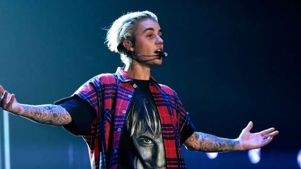 Justin Bieber performs onstage in Seattle.