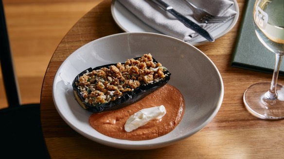 Tino's vegan-friendly dish of charred eggplant, savoury granola and house-made sunflower yoghurt.
