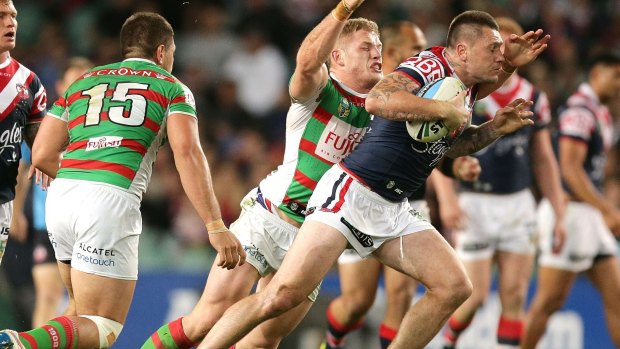 Welcome back: Shaun Kenny-Dowall takes off for the Roosters on Friday night.