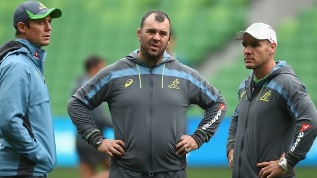 Coaching triumvirate: Michael Cheika (centre) with assistant coaches Stephen Larkham (left) and Nathan Grey.