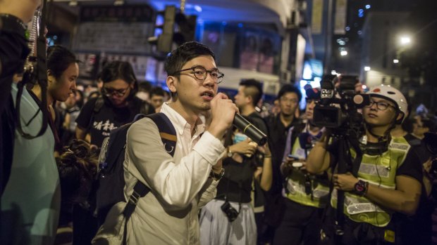 Nathan Law, lawmaker and chairman of Demosisto, addresses a protest near the Liaison Office of the Central People's Government in Hong Kong, China, last year.