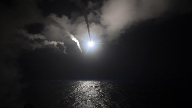 The guided-missile destroyer USS Porter (DDG 78) launches a tomahawk land attack missile in the Mediterranean Sea on Friday.