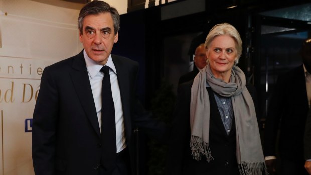 Scandal-plagued Francois Fillon with his wife, Penelope, who he is accused of having paid for work not done.