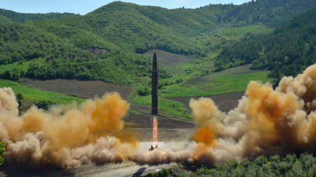 North Korea's first launch of a Hwasong-14 intercontinental ballistic missile, which took place in early July.