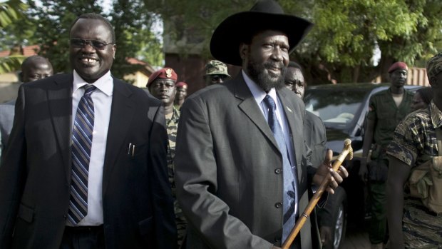 Then South Sudan vice-president Riek Machar, left, and President Salva Kiir, centre, arrive for a press conference in Juba, South Sudan in 2010.