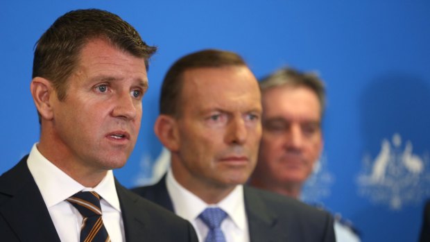 Seeking tighter bail laws: NSW Premier Mike Baird with Prime Minister Tony Abbott and Andrew Scipione.