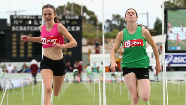 Controversy reigns: Talia Martin (left) wins the Stawell Gift.