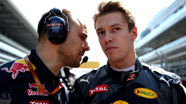 Daniil Kvyat (right) apologised to Sebastian Vettel.