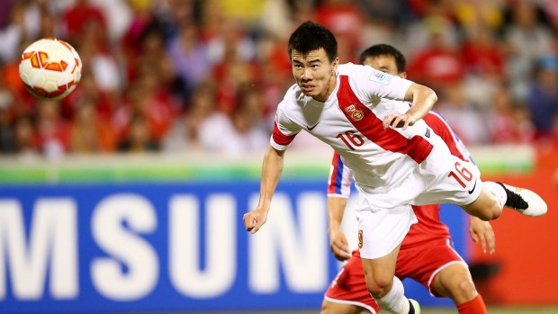 Rising Sun: Sun Ke of China scores against North Korea.