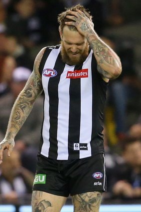 A dejected Dane Swan after the loss to West Coast Eagles.