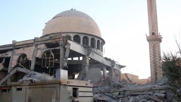 An image distributed by IS's propaganda agency Amaq shows a Raqqa mosque damaged by the coalition earlier this month.