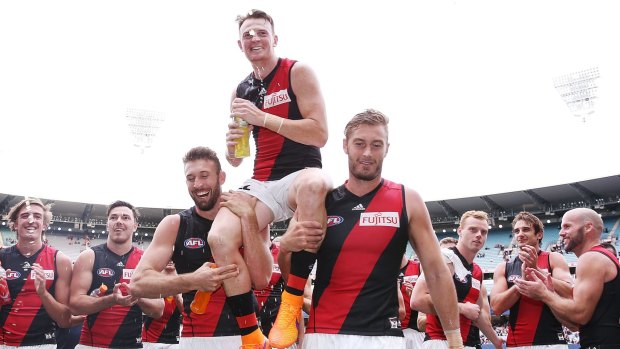 Essendon's Brendon Goddard is carried off after a win in his 250th game, against Carlton last April.