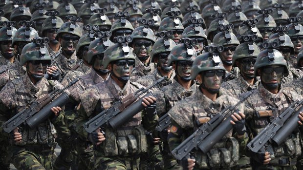 Commandoes march across Kim Il-sung Square during Saturday's military parade in Pyongyang.