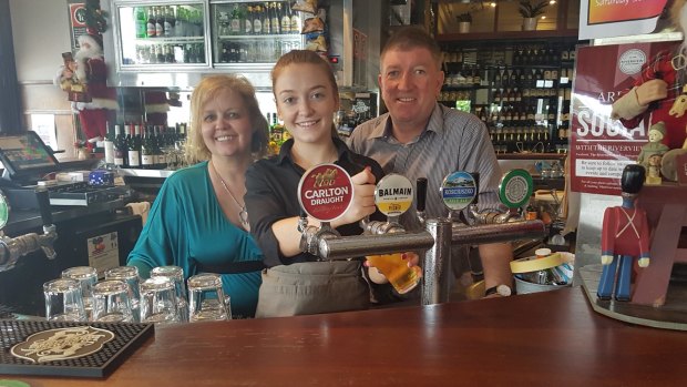 Nicola Farrell (left), Jimmy Queally (right) and their daughter Caoimhe of Balmain's Riverview Hotel.
