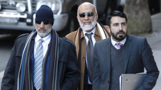 Mamdouh Elomar, left, and his brother Ibrahim Elomar, centre, arrive at the Supreme Court for a bail hearing on Tuesday.