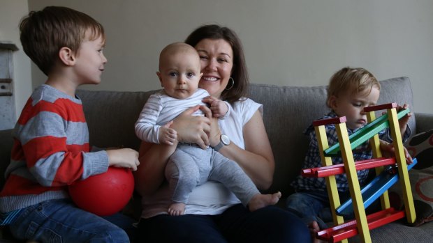 Rachel Dale with sons Nathanael, Micah and Elijah in their Sydney home. 