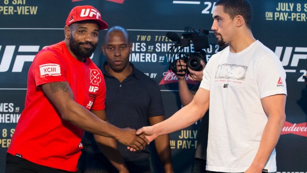 Nothing but respect: Yoel Romero, left, and Robert Whittaker shake hands before their fight at UFC 213.