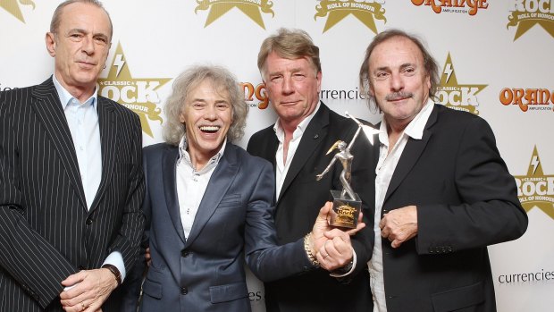 Francis Rossi, Alan Lancaster, Rick Parfitt and John Coghlan  with The Classic Album Award , London, 2012.