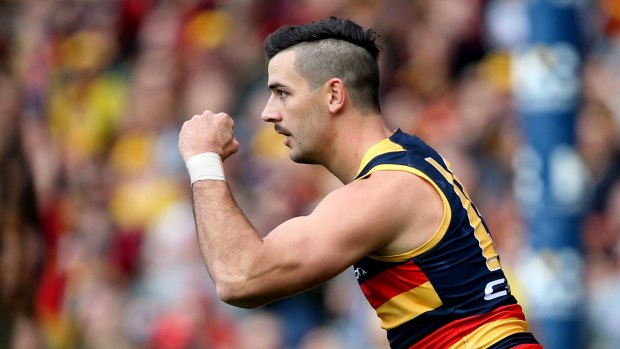Crows captain Taylor Walkers signs on until the end of 2021.